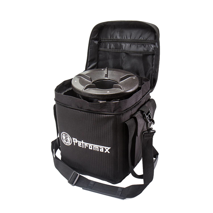 Durable black ripstop fabric transport bag with reinforced walls and removable shoulder strap, designed for safely carrying an outdoor stove, ideal for camping and farm use.