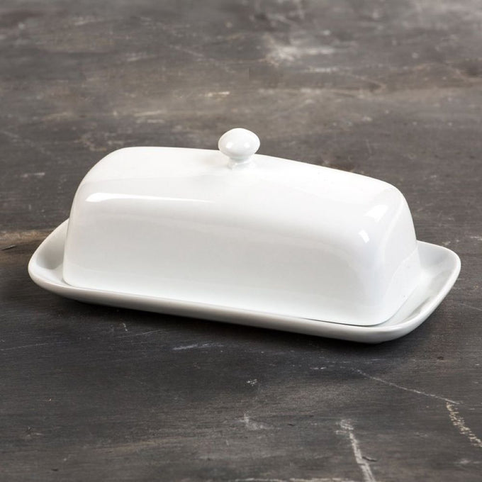 Classic white porcelain butter dish with knob, sturdy two-piece design, ideal for Kitchen & Food, Specialty Equipment, Making Butter, Storage and Serving, Best Sellers, and Promo Eligible collections.