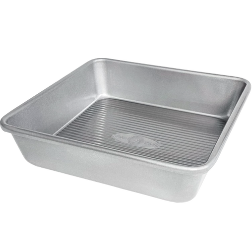 Heavy gauge aluminized steel square cake pan with seamless design and nonstick silicone coating, ideal for baking cakes and brownies, part of Kitchen & Food and USA Made collections.
