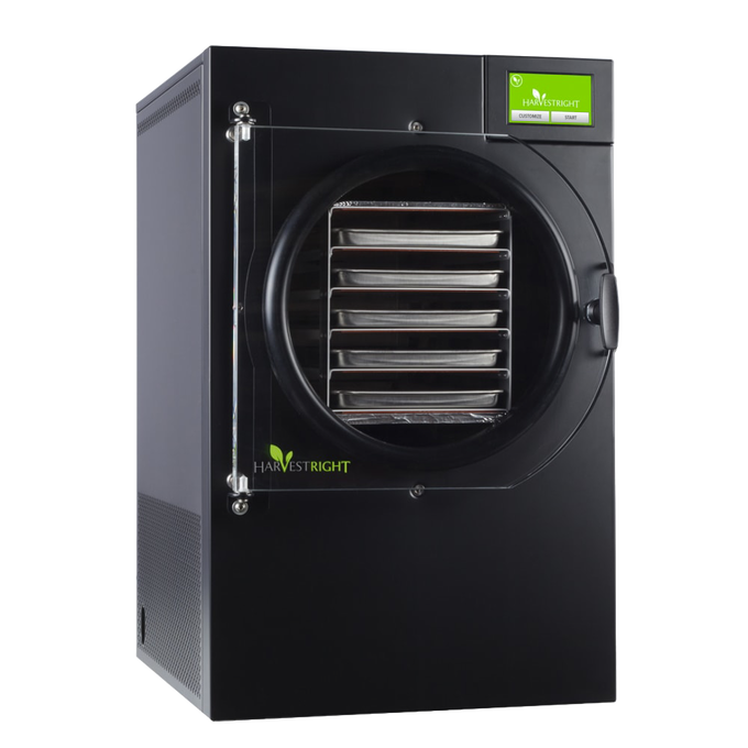 Sleek black freeze dryer with clear door revealing multiple stainless steel trays inside, featuring a green touchscreen control panel, designed for Kitchen & Food, Food Preservation, Freezing, Drying, and Best Sellers collections.