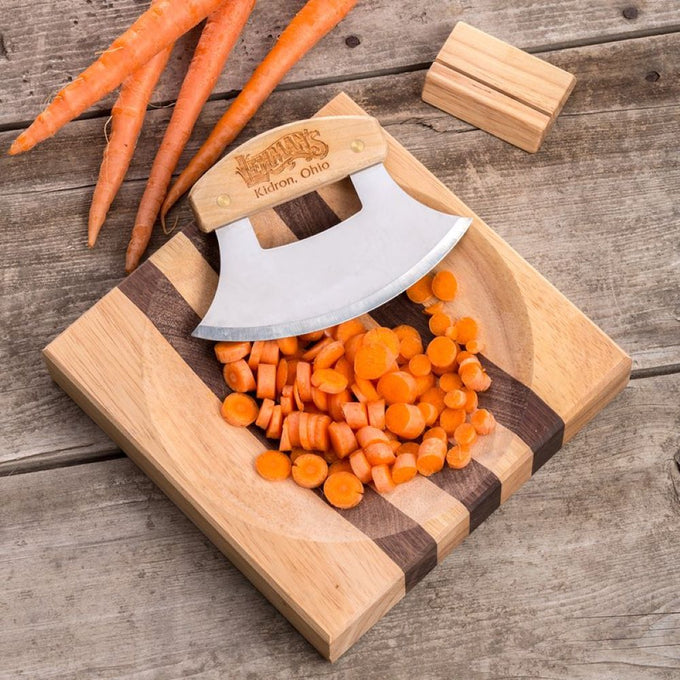 Crescent-shaped chopping knife resting on a handcrafted wooden bowl with sliced carrots, ideal for quick dicing in Kitchen & Food, Knives & Axes, and Food Prep collections.