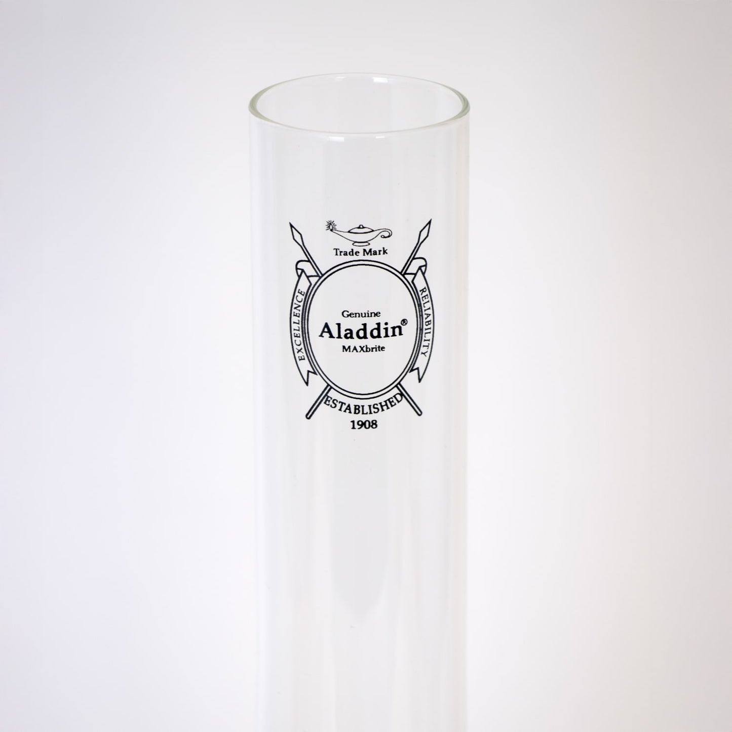 Clear borosilicate glass chimney with black printed logo, designed for enhanced light output in lamps, featured in Lamps & Lighting and Chimneys and Globes collections.