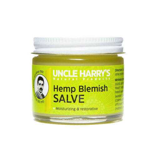 Clear glass jar with metal lid containing Uncle Harry's Hemp Blemish Salve, a handcrafted moisturizing balm made in USA, part of Health & Wellness, Balms, Creams and Lotions, and Best Sellers collections.