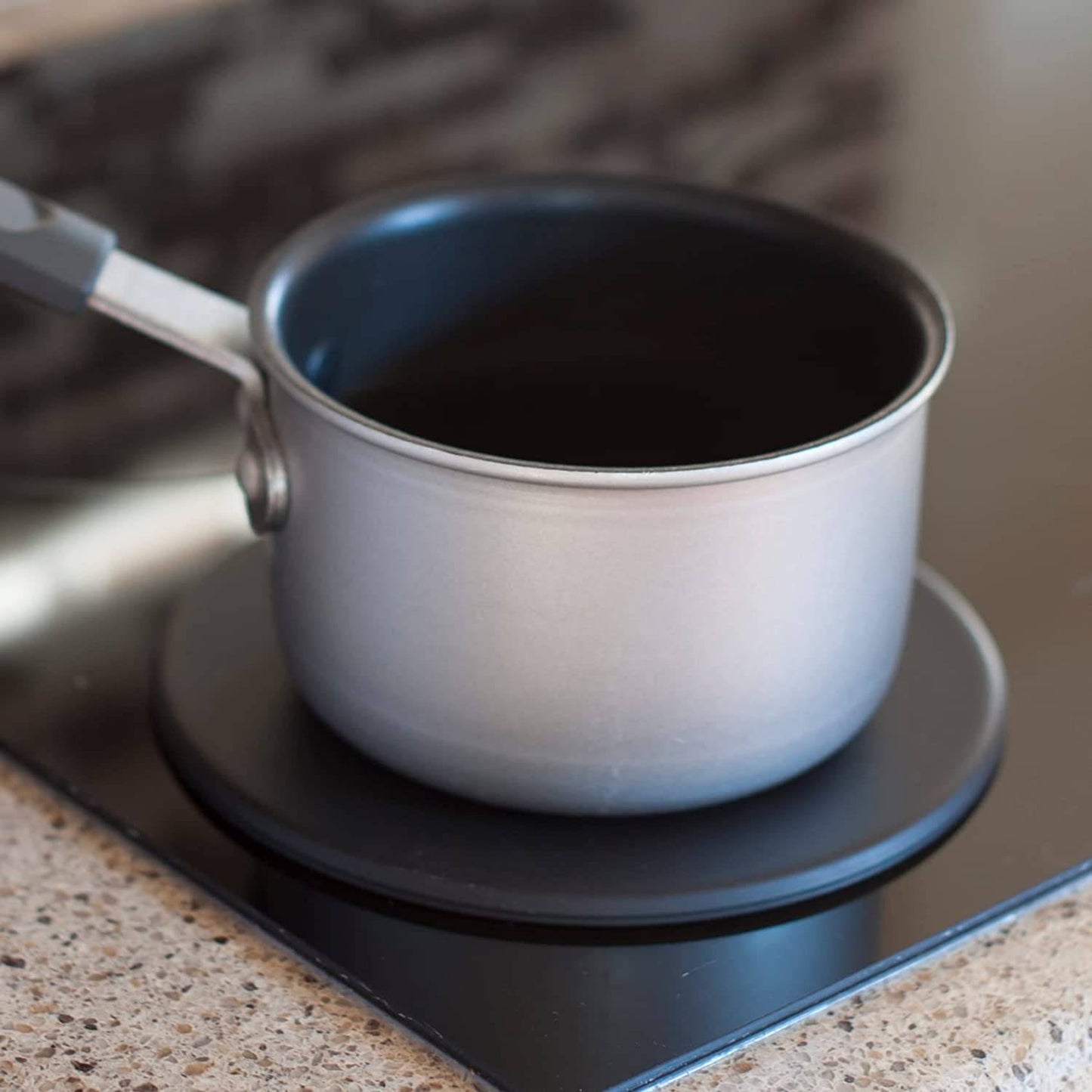 Handcrafted induction heat diffuser plate made in USA, providing an even flat cooking surface when placed over gas or electric stove burners, ideal for Kitchen & Food and Kitchen Gadgets collections.