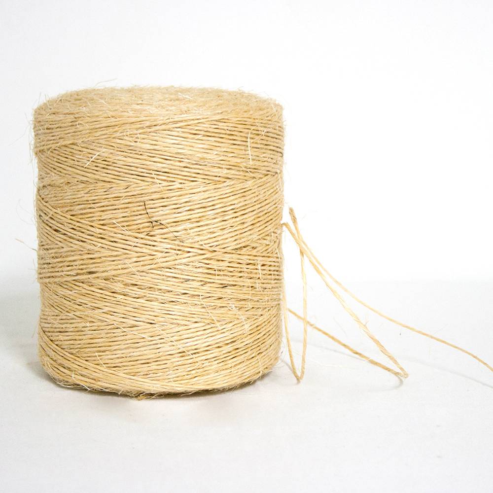Large spool of natural sisal twine with visible fibers, ideal for garden and farm tasks, featured in Farm, Garden & Tool, Garden Accessories, Best Sellers, and Promo Eligible collections.