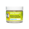 Small glass jar of handcrafted all-natural alkalizing mineral peppermint toothpaste with a white lid, featured in Health & Wellness, Grooming and Personal Hygiene, USA Made, and Best Sellers collections.