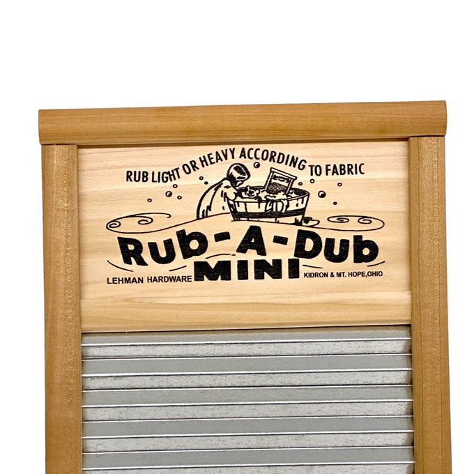 Handcrafted mini washboard with a wooden frame and galvanized wavy surface, featuring a decorative printed nameplate; ideal for Home & Decor, Laundry Supplies, USA Made, and Best Sellers collections.