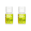 Two small bottles of handcrafted all-natural tooth whitener powder with bright green labels, featuring lemon as a key ingredient, ideal for health, grooming, and USA made collections.