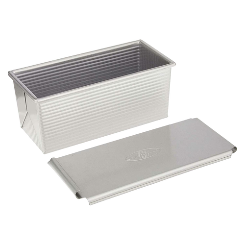 Heavy-duty aluminized steel loaf pan with matching lid, handcrafted for even heat conduction and consistent baking results; ideal for Kitchen & Food, Baking Supplies, and Cookware collections.