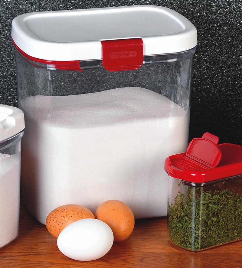 Clear plastic flour storage container with a white and red airtight lid, designed to keep flour fresh and organized; featured in Kitchen & Food, Storage and Serving, Best Sellers, and Promo Eligible collections.
