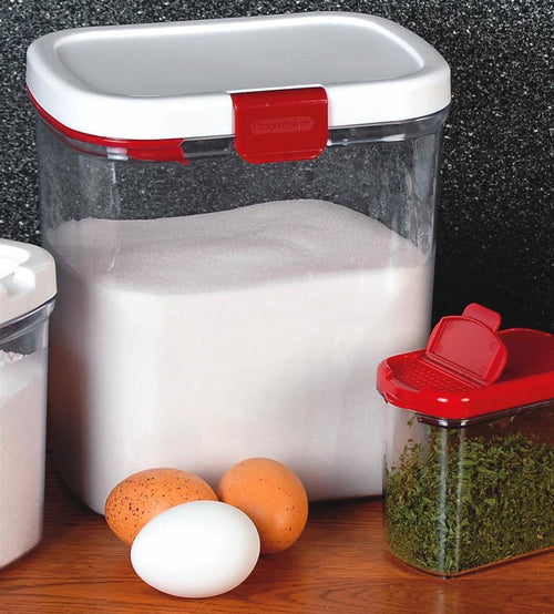 Clear plastic flour storage container with a white and red airtight lid, designed to keep flour fresh and organized; featured in Kitchen & Food, Storage and Serving, Best Sellers, and Promo Eligible collections.