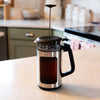 Stainless steel and glass French press with black handle and plunger, designed for easy coffee brewing and cleanup, ideal for Kitchen & Food, Brewing Coffee and Tea, and Best Sellers collections.