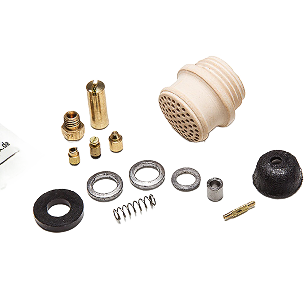 Set of various brass and ceramic replacement parts including a ceramic burner head, seals, springs, and fittings, crafted for lamps and lighting maintenance, suitable for lamps, parts and accessories collections.