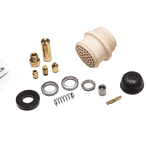 Set of various brass and ceramic replacement parts including a ceramic burner head, seals, springs, and fittings, crafted for lamps and lighting maintenance, suitable for lamps, parts and accessories collections.