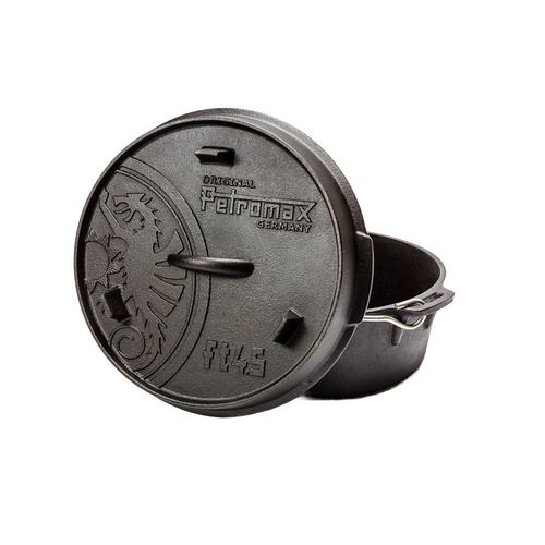 Handcrafted Petromax cast iron Dutch oven with flat base and embossed lid featuring a dragon emblem and metal bail handle, ideal for Kitchen & Food, Cookware, Cast Iron, Best Sellers, Promo Eligible collections.