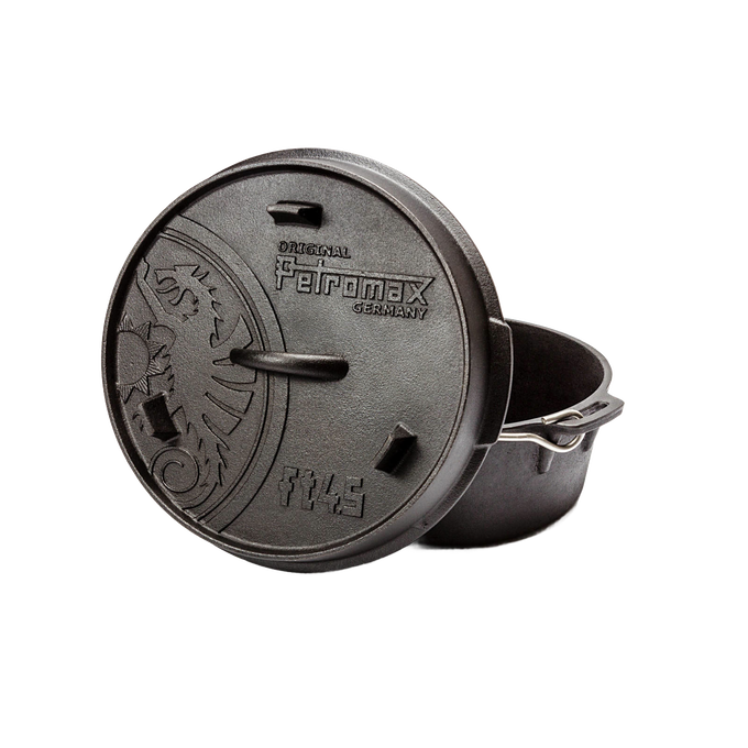 Handcrafted Petromax cast iron Dutch oven with flat base and embossed lid featuring a dragon emblem and metal bail handle, ideal for Kitchen & Food, Cookware, Cast Iron, Best Sellers, Promo Eligible collections.
