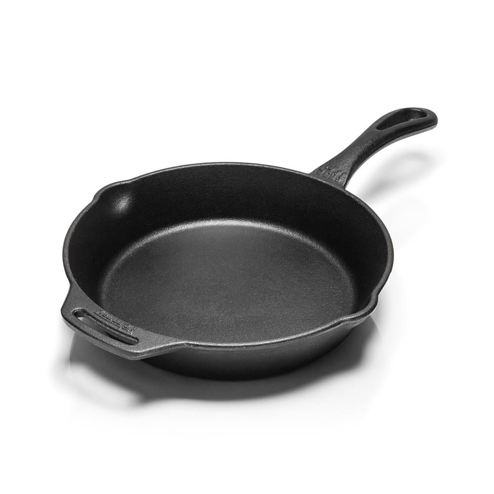 Black cast iron skillet with a long handle and helper grip, designed for versatile cooking in Farm, Garden & Tool, Kitchen & Food, Camping, Cookware, Cast Iron, Best Sellers, and Promo Eligible collections.