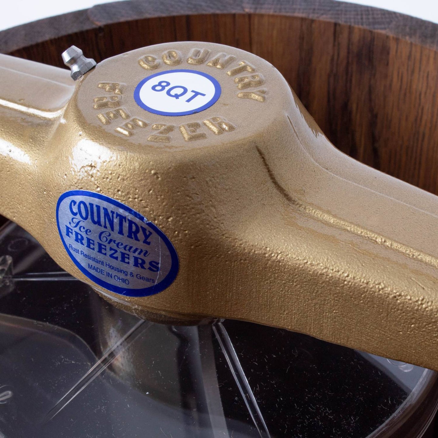 Close-up of a handcrafted wooden ice cream freezer showing detailed brass crank arm with "Country Freezer" label, highlighting rugged construction in Kitchen & Food and Specialty Equipment collections.