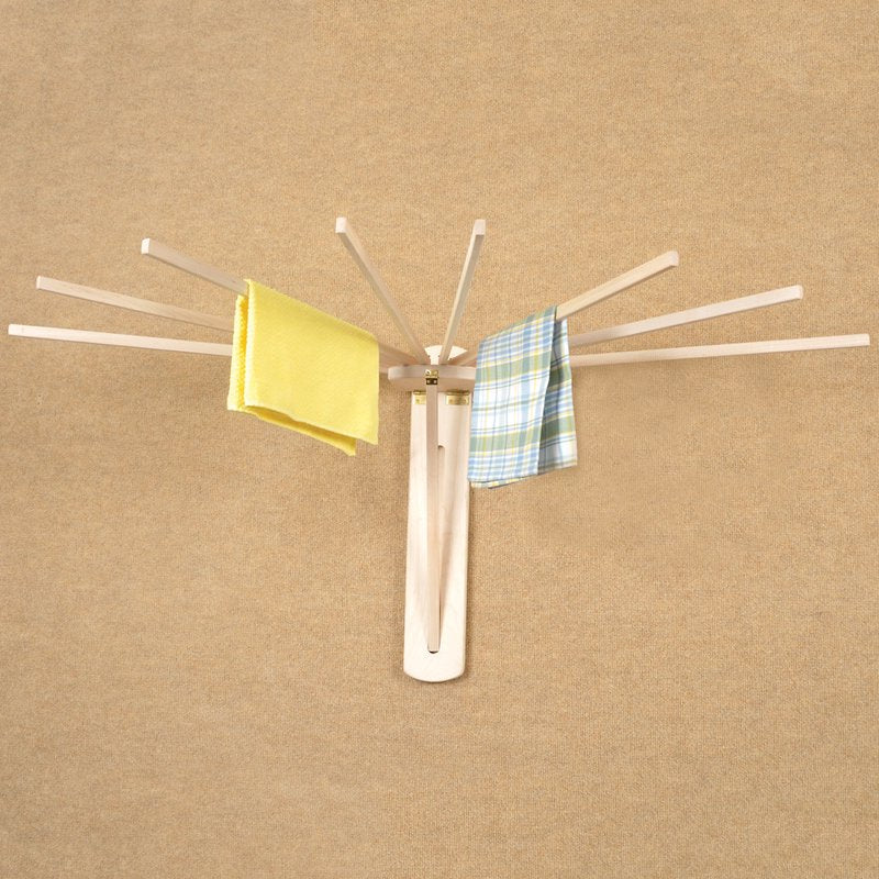 Handcrafted wooden wall dryer with eight fold-out arms and sturdy zinc-plated hinges, made in USA, perfect for laundry supplies, home decor, and drying accessories collections.