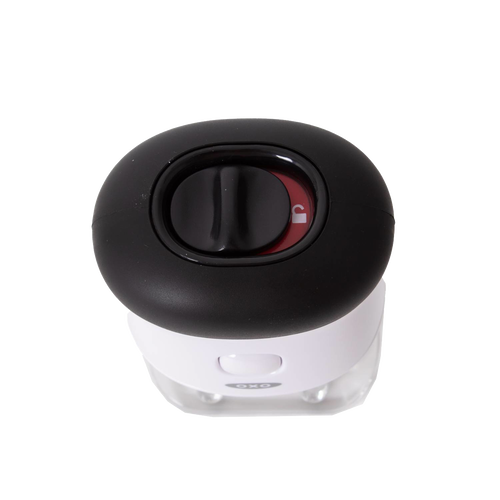 Top view of OXO bladed meat tenderizer showing black safety lock dial on white body with non-slip grip, a Kitchen & Food, Specialty Equipment, Butchering Supplies, and Best Sellers item.