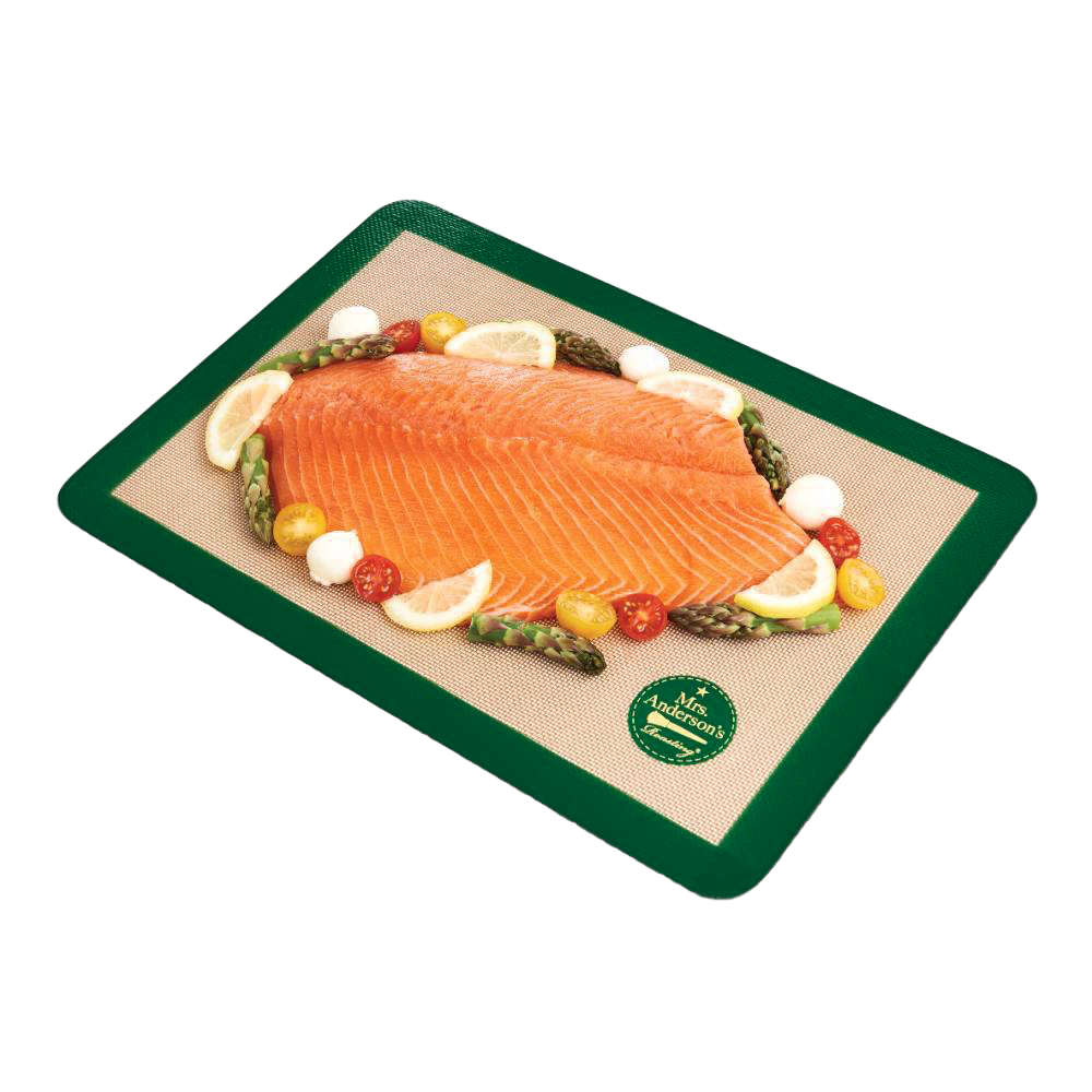 Half-size non-stick green-bordered silicone baking mat with woven glass fibers, featuring a salmon fillet surrounded by vegetables, suited for Kitchen & Food and Baking Supplies collections.