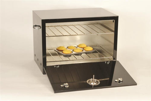 Black heat-resistant steel oven with two racks and front door open, containing muffins on a tray, handcrafted and Amish made, ideal for stoves and cookstoves collections in the USA Made category