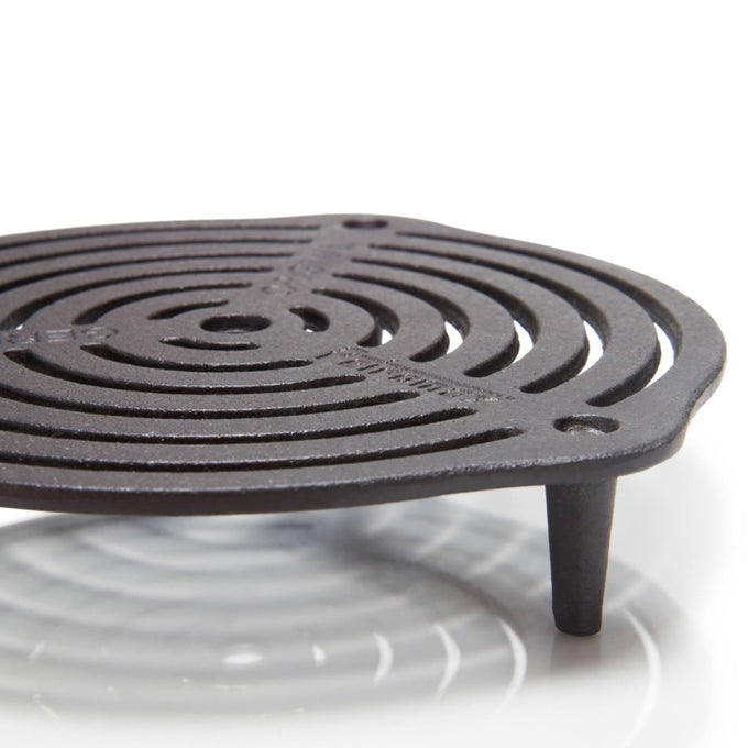 Round cast iron cooking grate with three short legs designed for elevated, even heat distribution, suitable for baking and roasting in Dutch ovens from Farm, Garden & Tool, Kitchen & Food, and Camping collections.
