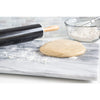 Silky smooth marble surface with dough ready for rolling, a wooden-handled rolling pin, and a glass bowl of flour with whisk, featured in Kitchen & Food and Baking Supplies collections.