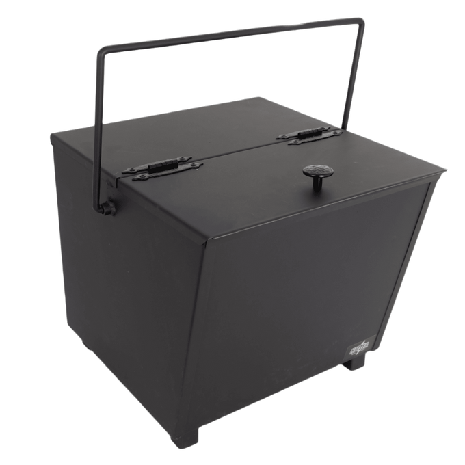 Heavy-duty steel ash carrier with hinged lid and balanced handle for safe ash disposal, featuring sturdy legs and back assist handle, crafted in USA for Hearth Accessories and Stoves collections.