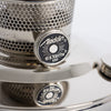 Close-up of the adjustment knob on a handcrafted Aladdin chrome-plated oil lamp burner with perforated metal design, featured in Farm, Garden & Tool, Lamps & Lighting, and Emergency Supplies collections.