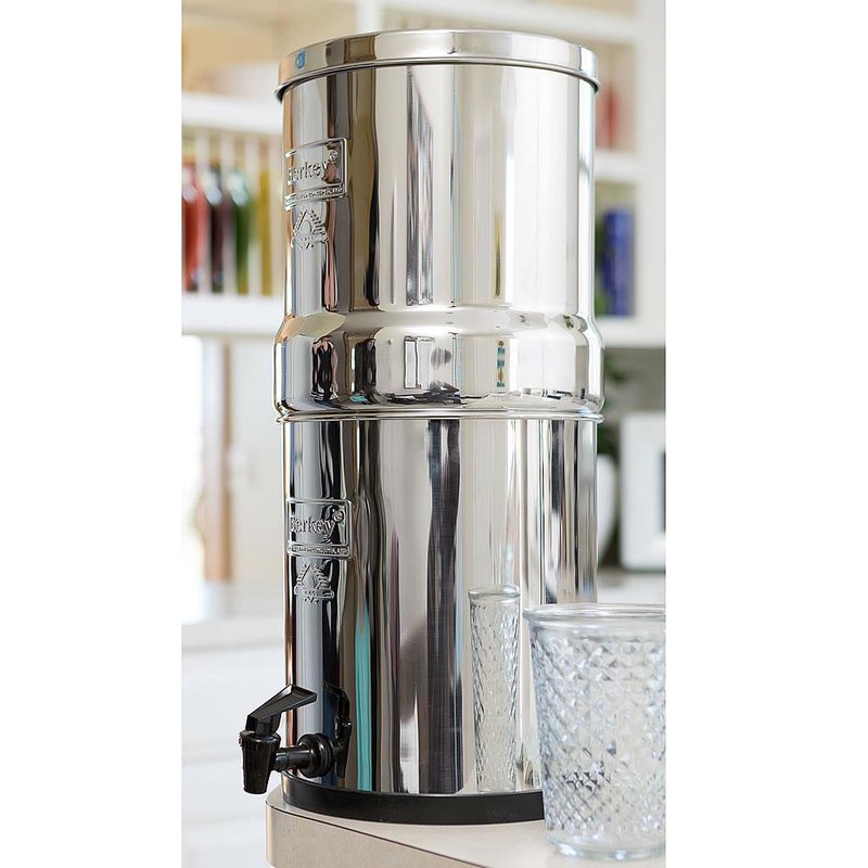 Polished stainless steel water filtration system with black spigot and lid, designed for home use and featured in Farm, Garden & Tool, Appliances, and Berkey Water Filters collections.