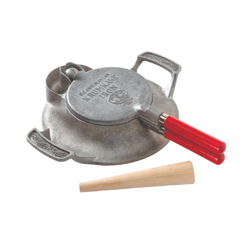 Handcrafted stovetop iron with red wooden handles for making traditional krumkake or pizzelle cookies, featuring an aluminum base and wooden tamper, made in USA for baking enthusiasts.