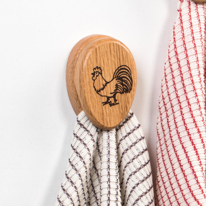 Handcrafted oak towel holder with a smooth protective finish featuring a rustic rooster engraving, made in USA and Amish made, perfect for Home & Decor and Household Helpers collections.