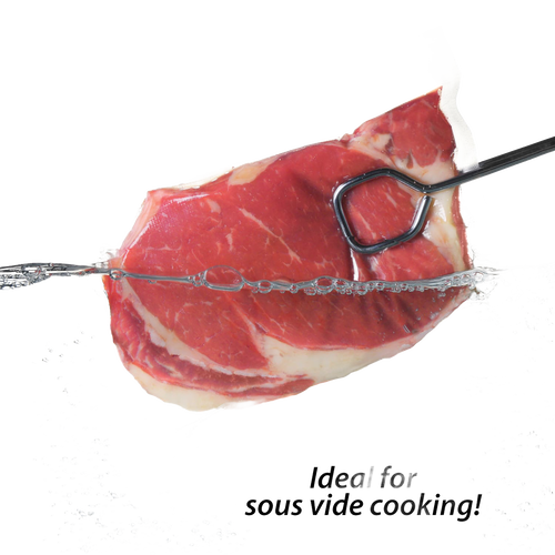 Raw marbled beef steak vacuum-sealed in a clear plastic bag with a metal meat fork, demonstrating food preservation for Kitchen & Food, Food Preservation, and Freezing collections.