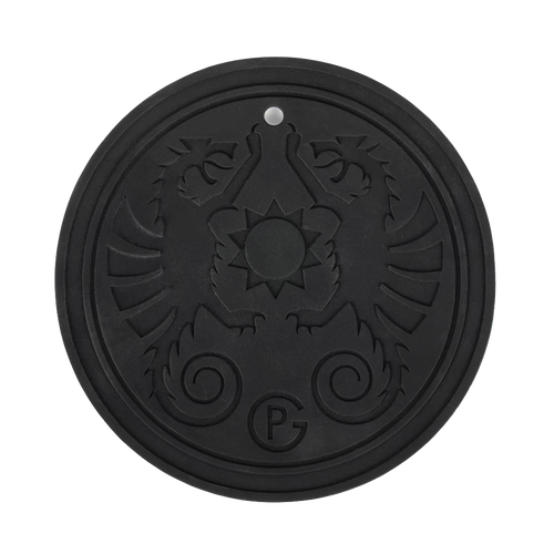 Black round silicone coaster with embossed twin griffin design and a central sun motif, temperature resistant and featuring a hanging eyelet, ideal for camping and lighting accessories.
