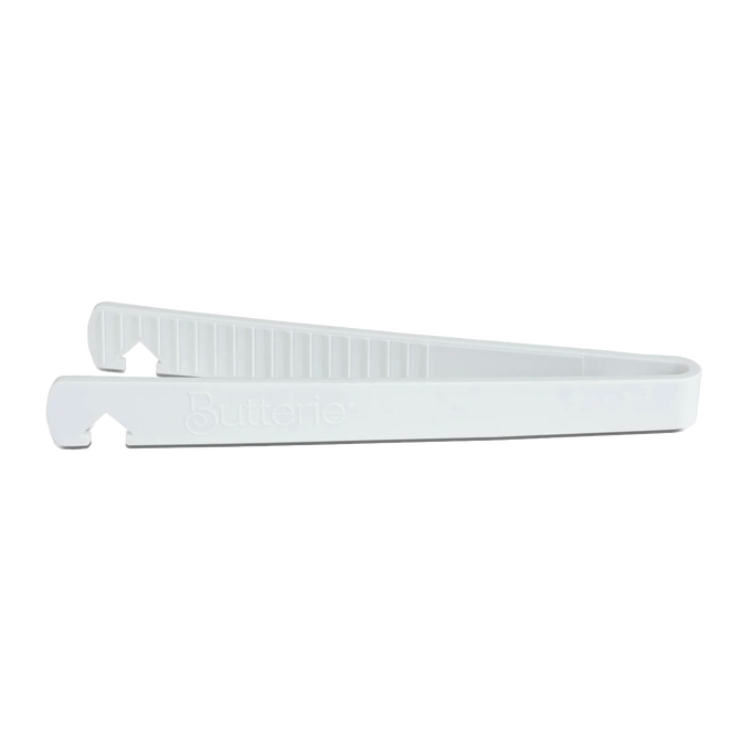White Butterie toaster tongs with serrated teeth and integrated hook, designed for safe handling in Kitchen Gadgets, Cooking and Baking Helpers, and Kitchen Accessories collections.