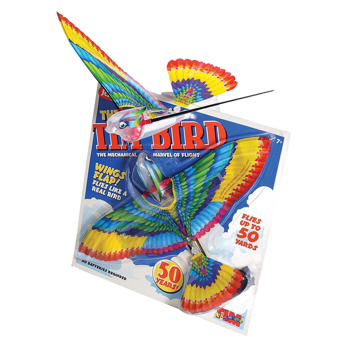 Colorful mechanical flying bird toy with vibrant red, yellow, blue, and green wings, displayed with original packaging promoting outdoor play, lawn games, and children's toys collections.