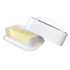 Large white butter dish with high-sided inner tray holding a stick of soft butter, designed to prevent mess and keep butter spreadable, ideal for kitchen storage and serving.