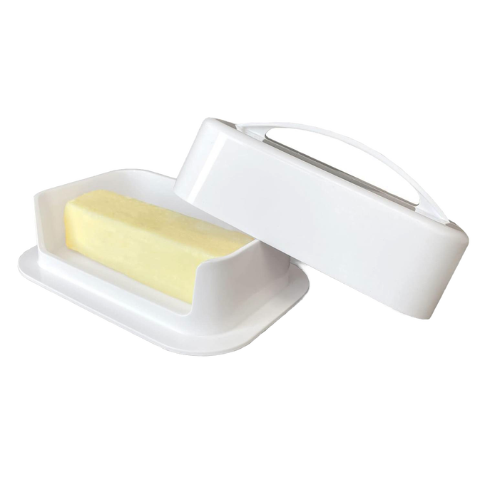 Large white butter dish with high-sided inner tray holding a stick of soft butter, designed to prevent mess and keep butter spreadable, ideal for kitchen storage and serving.