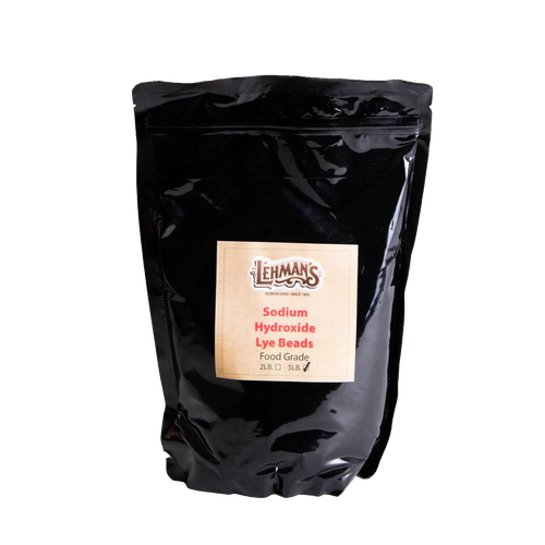 Resealable black bag of food-grade sodium hydroxide lye beads in 2-lb or 5-lb sizes, ideal for soapmaking and included in Health & Wellness, Soaps and Soapmaking, and USA Made collections.
