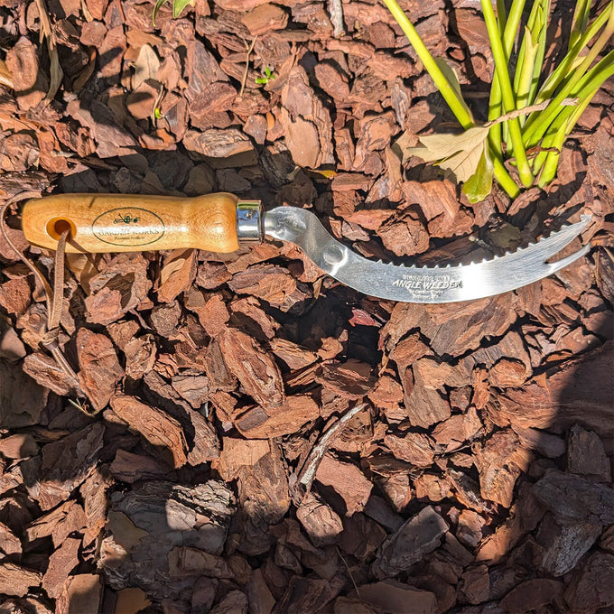 Gardening tool with a curved, serrated metal blade and a smooth wooden handle, designed for precision weeding, featured in Farm, Garden & Tool, Digging and Cultivating, and USA Made collections.