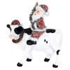 Handcrafted 6-inch resin figurine of Santa Claus riding a decorated black and white cow, adding charming country holiday spirit to Home & Decor, Holiday Decor, Best Sellers, and Promo Eligible collections.