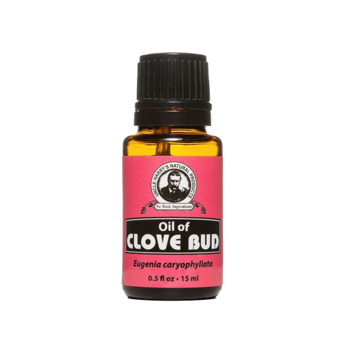 Amber glass bottle of handcrafted clove bud essential oil with black cap and red label, made in USA, ideal for aromatherapy, soapmaking, candlemaking, and health remedies.