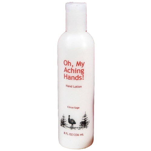 White 8 oz lotion bottle labeled Oh My Aching Hands hand lotion with citrus-sage scent, featuring black tree and bird illustrations, handcrafted and made in USA for Health & Wellness collections