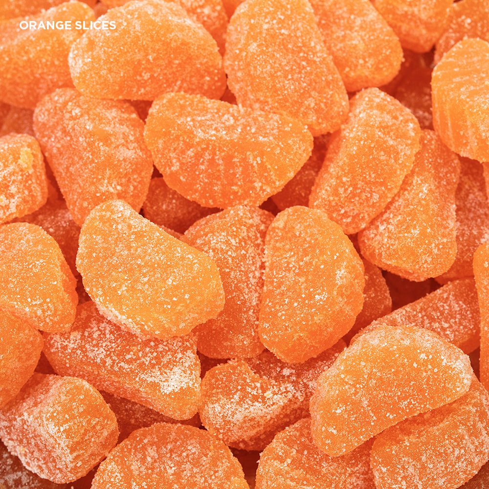Close-up of sugar-coated orange slice candies with a bright, chewy texture, evoking treasured sweet moments in Kitchen & Food, Snacks and Sweets, Food, Best Sellers, and Promo Eligible collections.