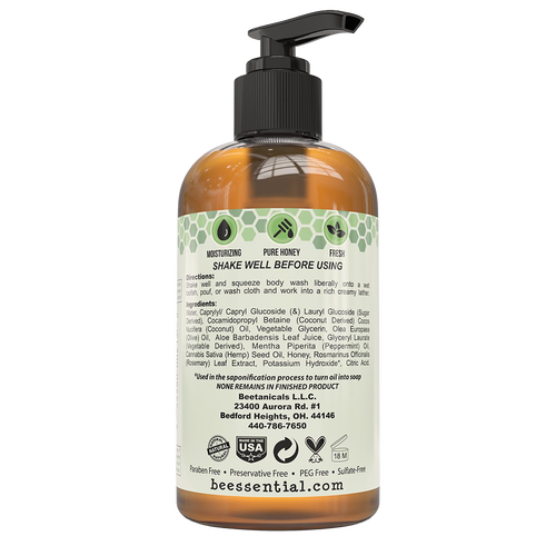 Back view of amber 8 oz pump bottle of natural body wash with detailed ingredient list, usage instructions, certification labels, and USA made in Ohio; featured in Health & Wellness, Soaps, and Best Sellers collections.