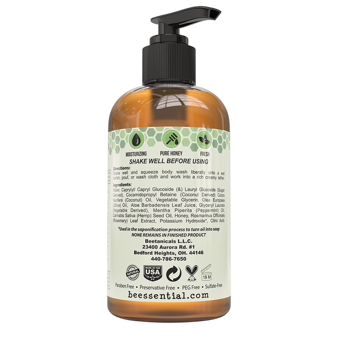 Back view of amber 8 oz pump bottle of natural body wash with detailed ingredient list, usage instructions, certification labels, and USA made in Ohio; featured in Health & Wellness, Soaps, and Best Sellers collections.
