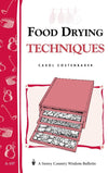 Cover of a book about drying fruits and vegetables featuring a red and white color scheme with an illustration of a food dehydrator and drying herbs, part of Kitchen & Food and Food Preservation collections.