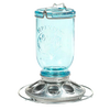 Rustic tinted-blue glass jar bird feeder with a metal base featuring multiple feeding ports, designed for farm, garden, animal care, and outdoor use collections.