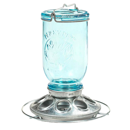 Rustic tinted-blue glass jar bird feeder with a metal base featuring multiple feeding ports, designed for farm, garden, animal care, and outdoor use collections.